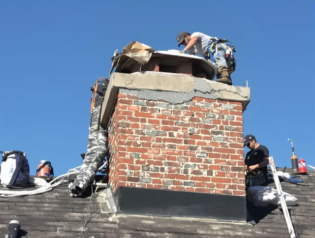 Bluffton Chimney Sweep installing a custom chimney crown in Bluffton, SC