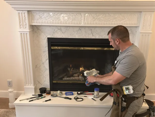 Bluffton Chimney Sweep performing fireplace maintenance in Bluffton, SC